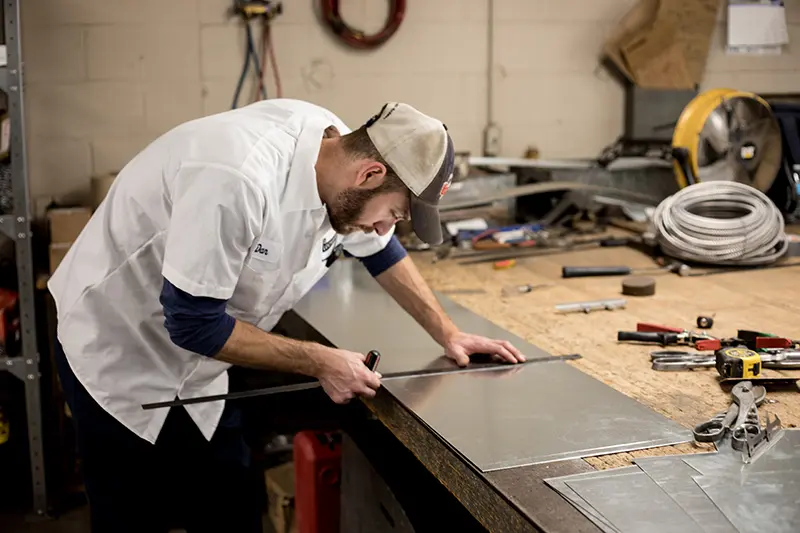 Lochard HVAC, Plumbing & Service technician working on ductwork installation and repair for residential and commercial HVAC systems, ensuring efficient heating and cooling solutions in Tipp City, expert ductwork services, HVAC maintenance, air quality improvement, duct system repair, and installation services. Lochard HVAC, Plumbing & Service provides HVAC installation, HVAC repair, HVAC maintenance, furnace installation, furnace repair, air conditioning installation, air conditioning repair, ductwork installation, ductwork repair, heating and cooling services, HVAC system upgrades, energy-efficient HVAC systems, emergency HVAC repair, commercial HVAC services, residential HVAC services, air quality solutions, humidity control, geothermal heating, heat pump installation, heat pump repair, WiFi thermostats, indoor air quality improvement, HVAC inspections, HVAC service in Tipp City, HVAC experts, affordable HVAC services, reliable HVAC technicians, Lochard HVAC, plumbing and HVAC specialists.