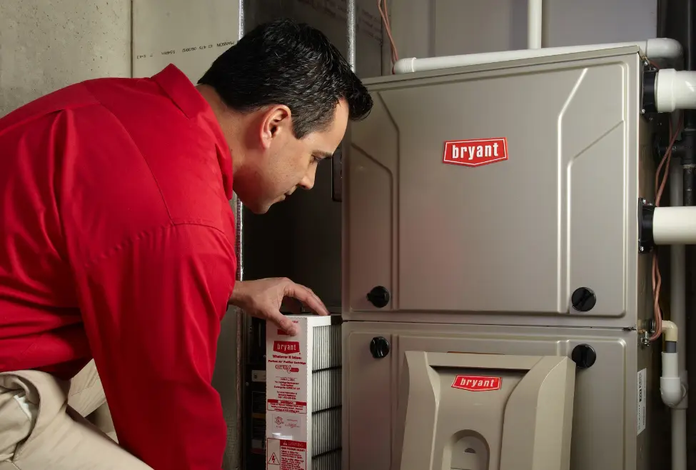 HVAC technician replacing a clogged air filter in a furnace to prevent frequent shutdowns. Lochard HVAC, Plumbing, and Service offers furnace repair, maintenance, and troubleshooting for overheating, short cycling, and airflow issues in Piqua, Troy, Sidney, Bellefontaine, and Wapakoneta. Call now for help with why does my furnace keep turning off, furnace keeps shutting down, furnace short cycling, furnace repair near me, furnace maintenance near me, HVAC troubleshooting, furnace issues, furnace not staying on, heating system shutting off, furnace service in Piqua, Troy furnace repair, Sidney HVAC technician, Bellefontaine furnace maintenance, furnace air filter issues, furnace overheating fix, furnace blower problems, furnace repair and maintenance, heating repair services near me, furnace diagnostics near me. We provide Furnace Repair Piqua, Furnace Repair Troy, Furnace Repair Sidney, Furnace Repair Bellefontaine, Furnace Repair Celina, Furnace Repair Wapakoneta, Furnace Repair St. Marys, Furnace Repair Tipp City, Furnace Repair West Milton, Furnace Repair Covington, Furnace Repair St. Paris, Furnace Repair Versailles, Furnace Repair New Bremen, Furnace Repair Minster, Furnace Repair Anna, Furnace Repair Fort Loramie, Furnace Repair Russia, Furnace Repair Jackson Center, Furnace Repair Indian Lake, Furnace Repair Bradford, Furnace Repair Botkins, Furnace Repair Degraff, Furnace Repair Quincy, Furnace Repair Houston, Furnace Repair Casstown, Furnace Repair Kettlersville.