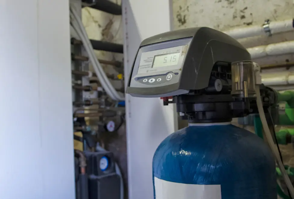 Water softener system installed in a home, reducing hard water issues and improving water quality. Lochard HVAC, Plumbing, and Service offers water softener installation and maintenance in Piqua, Troy, Sidney, and nearby areas. Reach out today for help with how much is a water softener system, water softener cost, price of water softener system, water softener installation cost, cost to install water softener near me, best water softener system price, affordable water softeners, whole house water softener cost, water softener system installation, plumbing for water softener, water treatment system cost, home water softener price, salt-based water softener cost, tankless water softener price, water filtration and softener systems, Lochard HVAC Plumbing and Service water softener installation, water softener maintenance near me, residential water softener systems, commercial water softener installation, hard water solutions near me, best water softener system for hard water, water conditioner vs water softener cost, water softener repair cost, how much does a plumber charge to install a water softener, water softener system for well water, best plumbing company for water softeners in Piqua, Troy, Sidney, Bellefontaine, Celina, Wapakoneta.