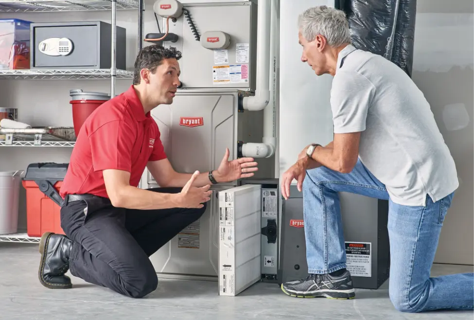 A furnace showing the pilot light and thermocouple, illustrating will cleaning a furnace thermocouple make it work again, furnace ignition troubleshooting, pilot light repair, and professional furnace maintenance by Lochard HVAC, Plumbing, and Service. Reach out to us now for help with will cleaning a furnace thermocouple make it work again, furnace thermocouple cleaning, furnace thermocouple replacement, pilot light not staying on, furnace won’t ignite, furnace ignition repair, furnace maintenance, furnace repair near me, HVAC repair near me, furnace troubleshooting, furnace not lighting, pilot light issues, furnace pilot light repair, heating system repair, furnace service, emergency furnace repair, furnace safety check, thermocouple testing, furnace ignition problems, furnace repair service near me, furnace inspection, heating repair near me.