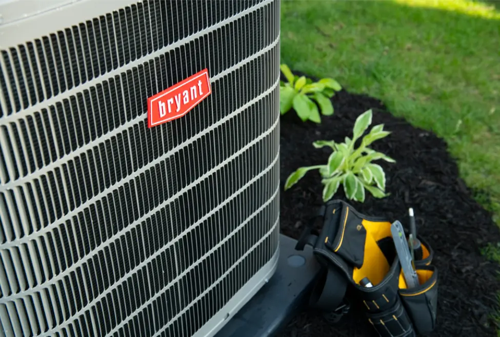 Outdoor air conditioner unit showing AC condenser coils during cleaning to improve airflow, cooling efficiency, and AC performance with professional AC maintenance from Lochard HVAC, Plumbing, and Service. Call us today for help with how to clean AC condenser, how to clean AC condenser coils, AC condenser cleaning, air conditioner condenser cleaning, clean outdoor AC unit, how to clean central air condenser, AC condenser coil cleaning, dirty AC condenser symptoms, AC condenser maintenance, outdoor AC unit cleaning, air conditioner maintenance, AC tune-up service, AC repair service, air conditioning repair, HVAC maintenance, HVAC cooling system service, condenser coil cleaning service, AC unit not cooling properly, AC airflow problems, AC compressor strain from dirty condenser, emergency AC repair near me, AC condenser cleaning near me, air conditioner repair near me, HVAC service near me, AC maintenance near me, central air repair near me, outdoor AC unit service near me, residential AC repair near me, cooling system inspection near me, professional AC coil cleaning near me.
