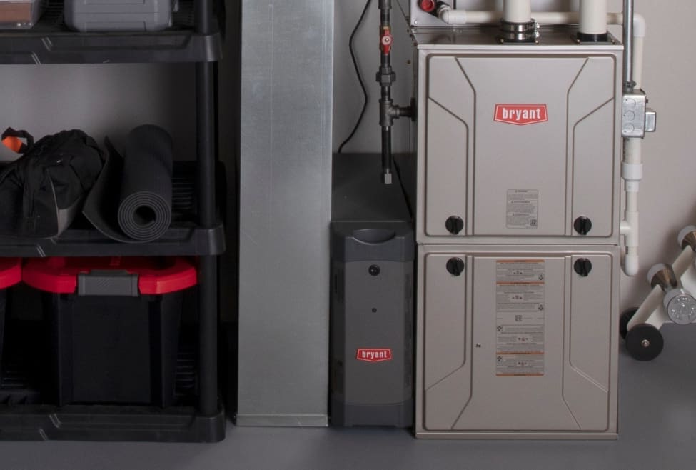 Bryant furnace in a residential basement, essential for home heating. Learn how to clean a flame sensor on a furnace to prevent heating issues. Lochard HVAC, Plumbing, and Service offers furnace maintenance, repair, and sensor cleaning to keep your system running efficiently. Trust us to help with how to clean flame sensor on furnace, cleaning a furnace flame sensor, furnace flame sensor maintenance, dirty flame sensor symptoms, how to tell if flame sensor is bad, flame sensor troubleshooting, furnace not igniting due to flame sensor, best way to clean a flame sensor, DIY flame sensor cleaning, professional furnace maintenance, HVAC repair near me, furnace repair services, heating system maintenance, Lochard HVAC, Plumbing, and Service, gas furnace troubleshooting, residential furnace repair, emergency furnace service, HVAC technician near me, furnace cleaning service, how to fix furnace ignition problems, gas furnace flame sensor replacement, heating repair near me, furnace maintenance near me, home heating system service, expert furnace cleaning, HVAC services near me, how to prevent furnace flame sensor issues, why does my furnace keep shutting off, local furnace repair experts, routine HVAC maintenance.