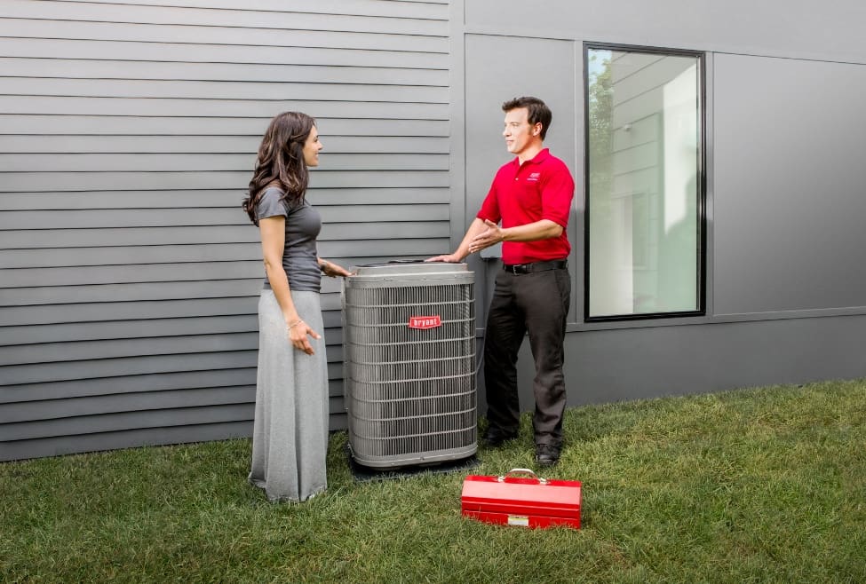 Outdoor air conditioner unit needing Freon recharge, illustrating common HVAC issues like low refrigerant, AC not cooling, and air conditioning repair services by Lochard HVAC, Plumbing, and Service. Trust us to help you with how much does it cost to put Freon in your AC unit, cost to recharge AC with Freon, AC refrigerant refill near me, air conditioner Freon recharge cost, Freon refill service, AC not cooling needs Freon, how to tell if AC needs Freon, HVAC refrigerant replacement, cost to add refrigerant to AC unit, air conditioning repair near me, AC service and recharge, HVAC recharge service near me, home AC Freon recharge, central air conditioner Freon cost, R-22 replacement options, refrigerant leak repair cost, air conditioner not blowing cold air, HVAC technician near me, Freon top-off cost, Lochard HVAC Freon recharge services.