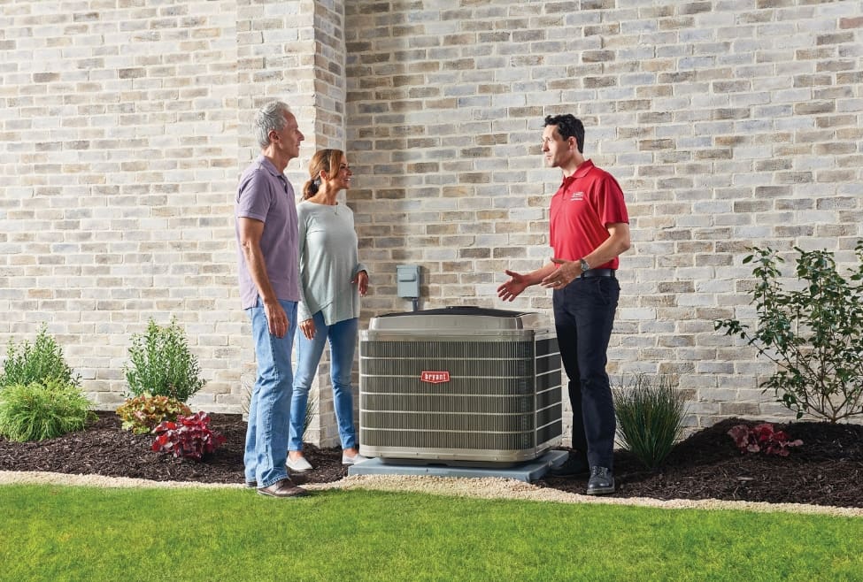 HVAC technician discussing mold removal and air duct cleaning with a happy homeowner, representing Lochard HVAC, Plumbing, and Service’s expert solutions for mold in HVAC systems, improving indoor air quality and preventing musty odors. Reach out today for help with what to do if your HVAC has mold, HVAC mold removal, mold in HVAC system, HVAC mold cleaning near me, signs of mold in air ducts, black mold in HVAC system, how to clean mold from HVAC, air duct mold removal services, AC smells musty, mold in air conditioner, HVAC maintenance near me, air duct cleaning services, HVAC inspection for mold, mold remediation HVAC, HVAC mold health risks, furnace mold symptoms, indoor air quality testing, air conditioning mold problems, central air system mold, mold in HVAC vents, HVAC cleaning and sanitizing, professional HVAC cleaning, mold prevention in HVAC systems, Lochard HVAC services, air duct cleaning near me, HVAC mold service near me.