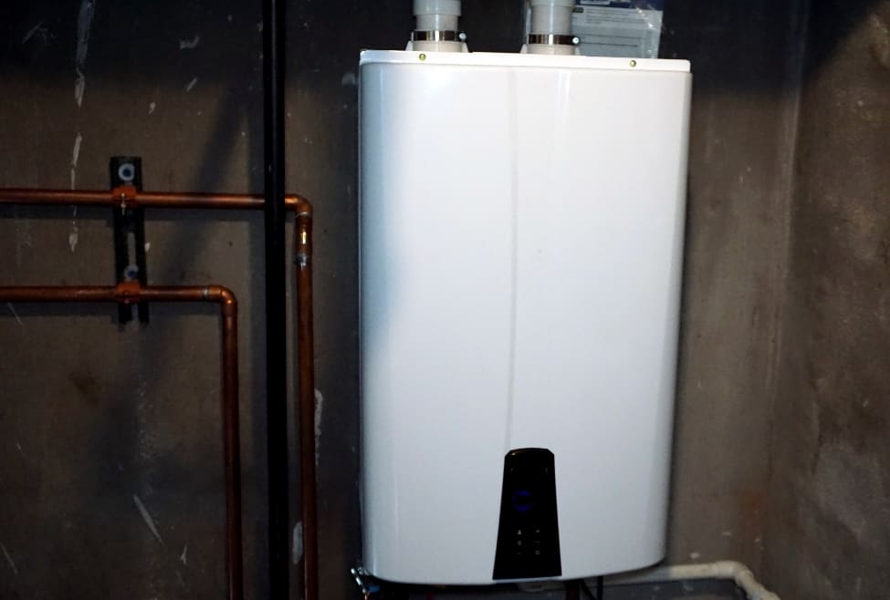 Tankless water heater installation showing energy-efficient hot water system, highlighting what's the average cost to install a tankless hot water heater with Lochard HVAC, Plumbing, and Service, professional plumbing services, water heater replacement, repair, and installation near me in Piqua, Troy, Sidney, and surrounding areas. Reach out now for help with what’s the average cost to install a tankless hot water heater, tankless water heater installation cost, cost of tankless water heater replacement, tankless hot water heater installation services, tankless water heater plumbers near me, water heater installation near me, tankless water heater repair near me, best tankless water heater installation, water heater replacement near me, tankless water heater installation Troy, tankless water heater installation Piqua, tankless water heater installation Sidney, tankless water heater installation Bellefontaine, tankless water heater installation Celina, tankless water heater installation Wapakoneta, water heater services near me, tankless water heater cost estimate, tankless water heater installation and repair, affordable tankless water heater installation, local tankless water heater plumbers, tankless hot water heater installation service near me.